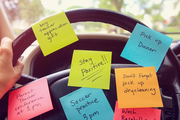 post-its-with-to-do-items-posted-all-over-a-car-stearing-wheel