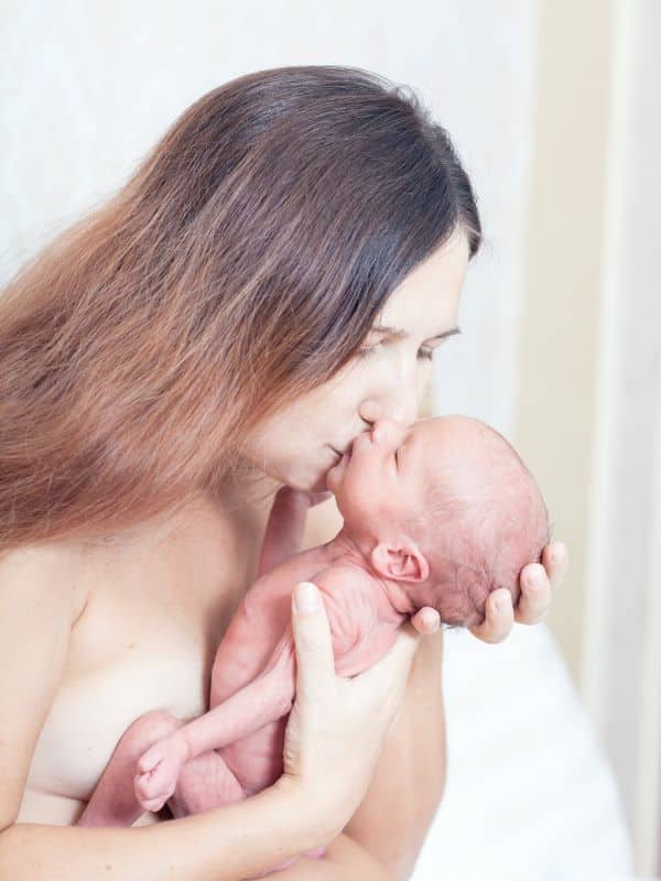 Mom-holding-her-baby-engaging-in-skin-to-skin