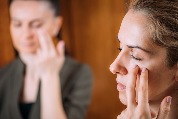 woman-practicing-tapping-as-a-relaxation-technique